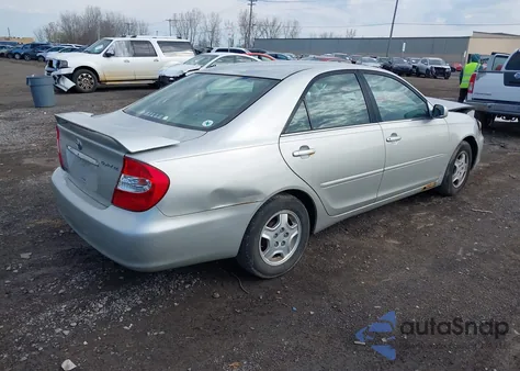 2003 Toyota Camry Le z USA, uszkodzony, nr VIN 4T1BE32K03U235551